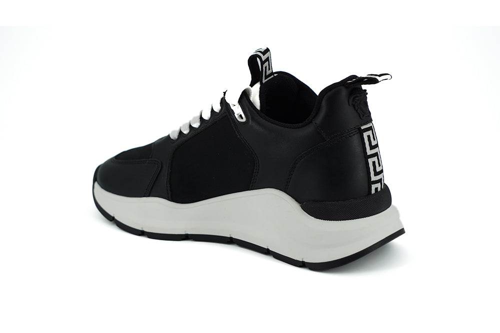 Versace Elegante monochrome Leder-Sneakers - Léoré