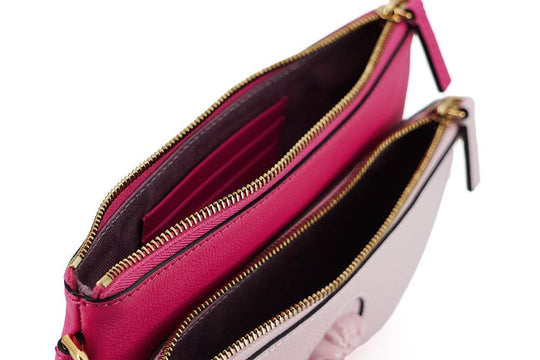 Versace Elegante rosa Lederbeutel-Clutch - Léoré