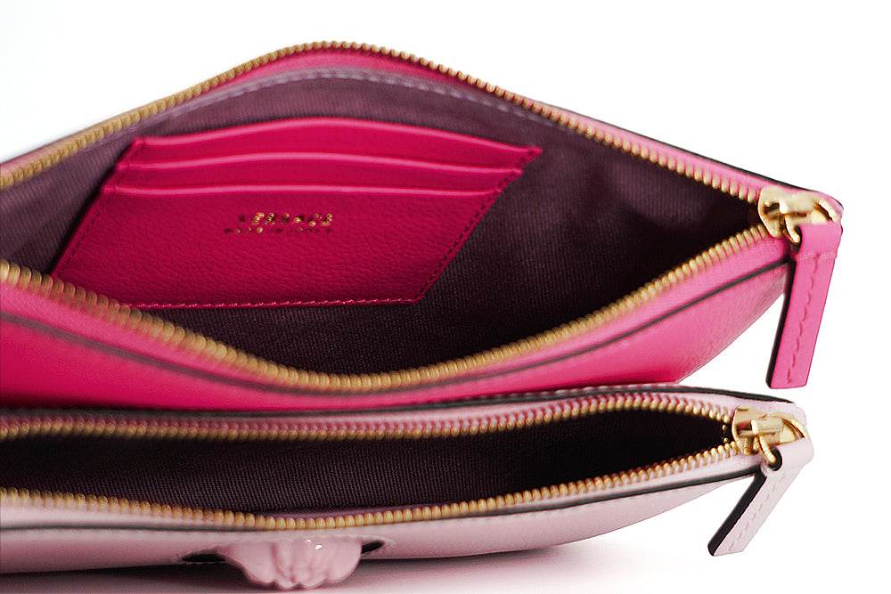 Versace Elegante rosa Lederbeutel-Clutch - Léoré