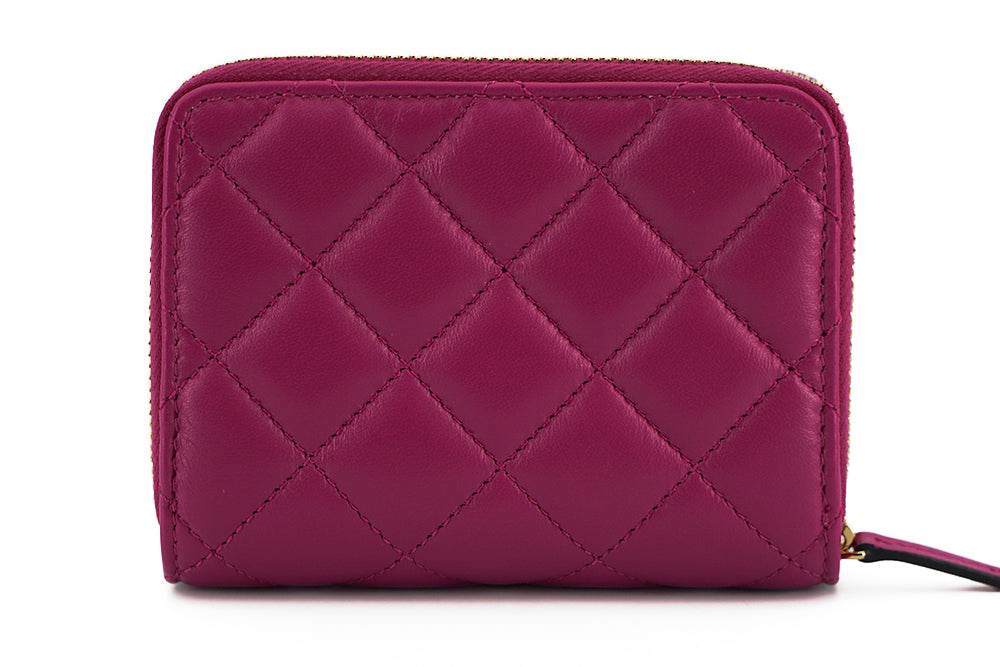 Versace Elegantes Portemonnaie aus gestepptem Leder in Lila - Léoré