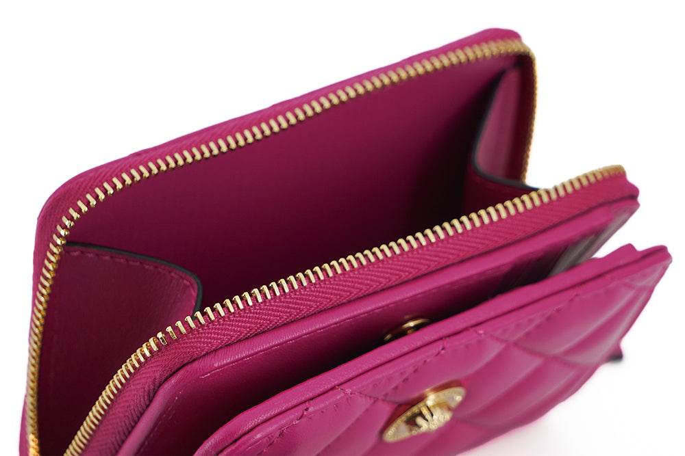 Versace Elegantes Portemonnaie aus gestepptem Leder in Lila - Léoré