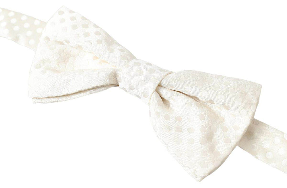 Dolce & Gabbana Elegante elfenbeinfarbene Seidenfliege mit Fantasiemuster - Léoré