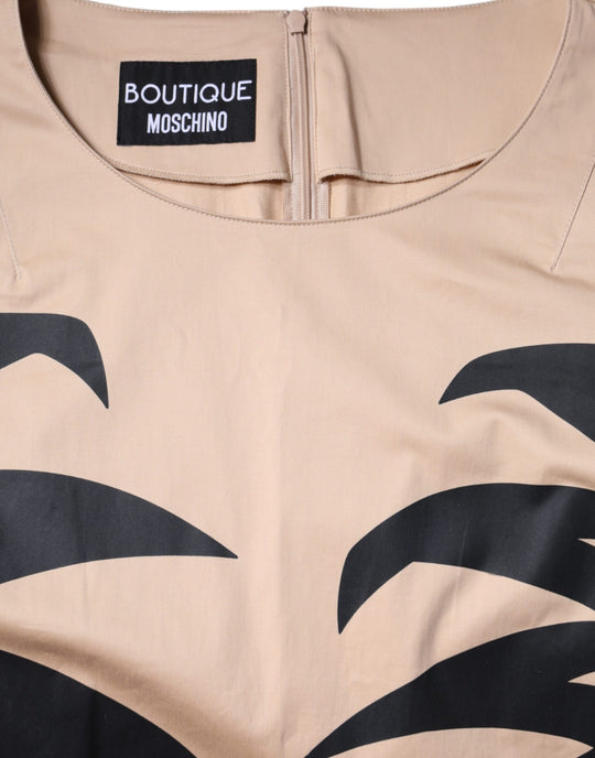 Moschino Beigefarbenes Baumwollkleid mit kurzen Ärmeln und Knielänge