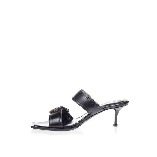Alexander McQueen Erhöhen Sie Ihre Schritte in zeitlosen schwarzen Ledersandalen - Léoré
