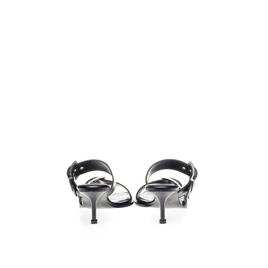 Alexander McQueen Erhöhen Sie Ihre Schritte in zeitlosen schwarzen Ledersandalen - Léoré