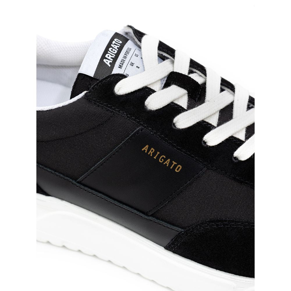 Axel Arigato Schwarzer und weißer Sneaker aus Stoff und Leder