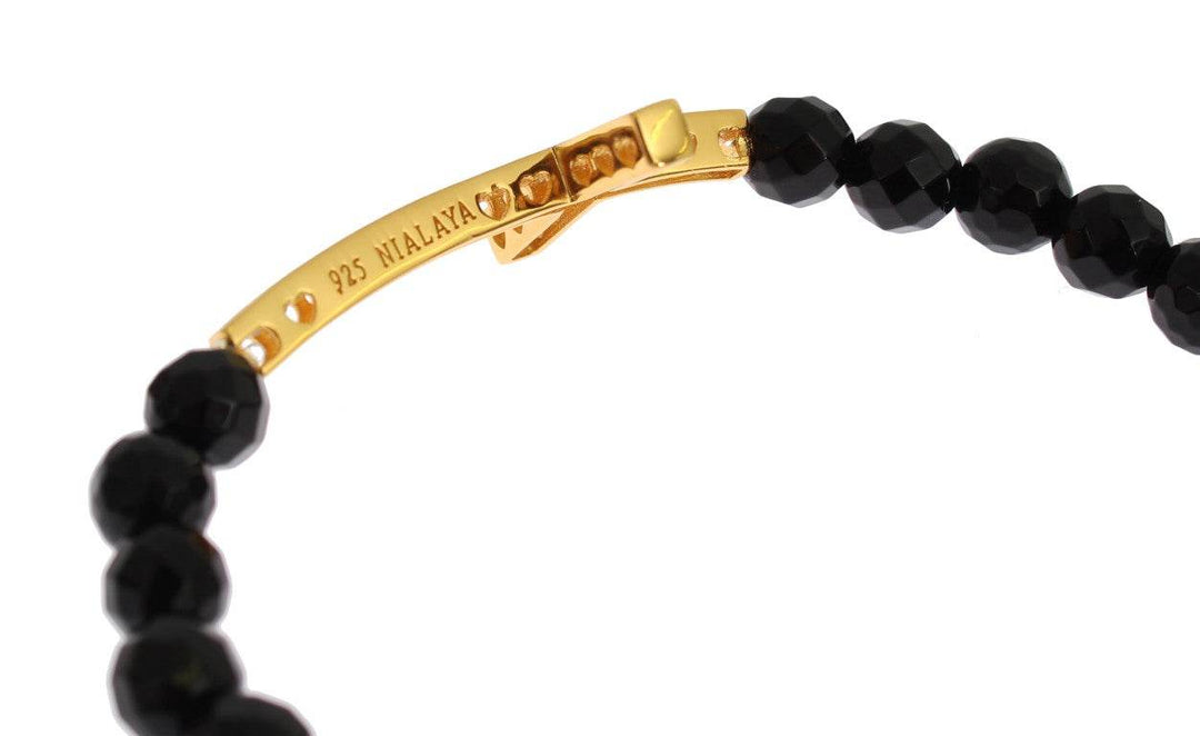 Nialaya Vergoldetes Sterling-Armband mit CZ-Diamant-Kreuz - Léoré