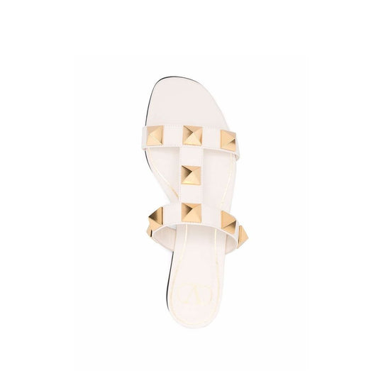 Valentino Garavani Flache Sandalen aus Leder mit römischen Nieten