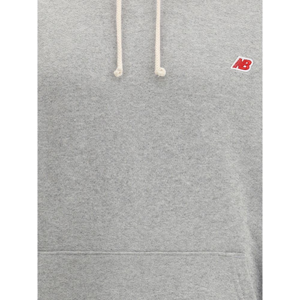 New Balance Kapuzenpulli mit Mini-Logo