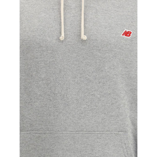 New Balance Kapuzenpulli mit Mini-Logo