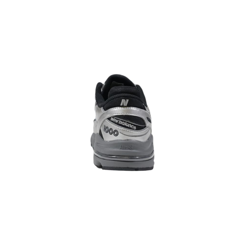 New Balance Silberner Synthetik-Sneaker