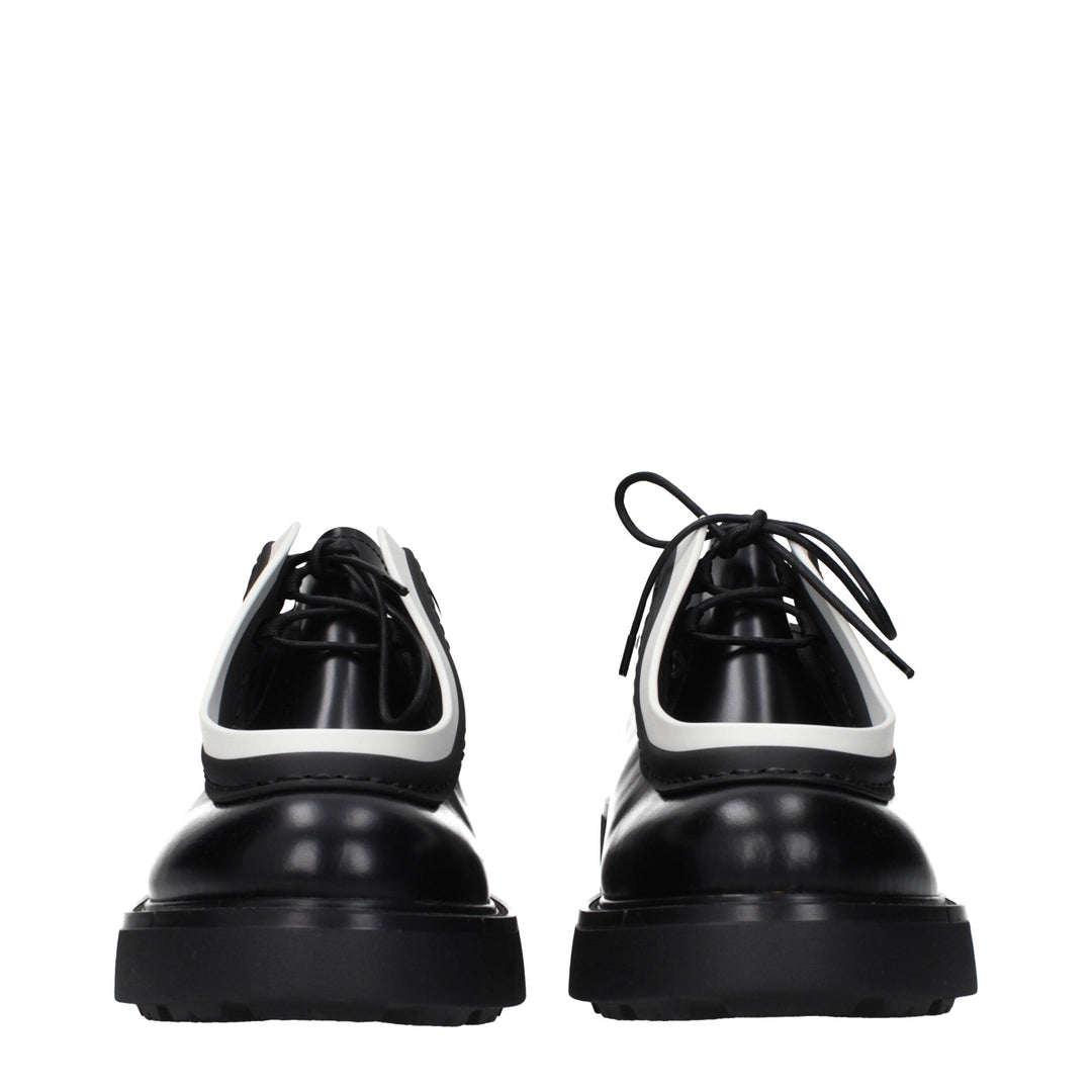 Prada Schwarze Leder Oxfords und Derbies