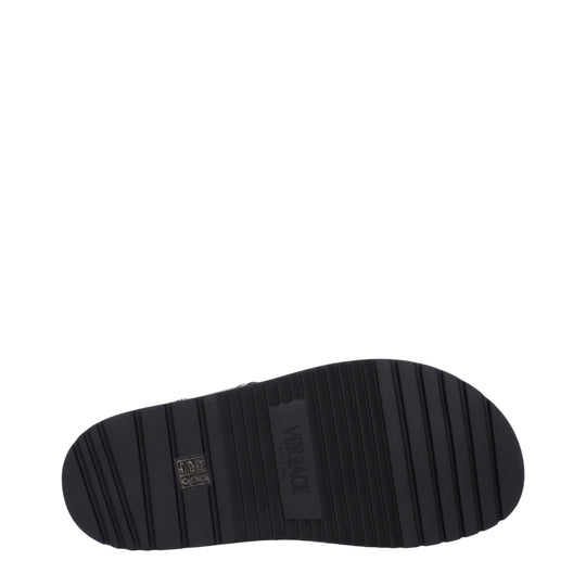 Versace Flache Sandalen aus schwarzem Leder